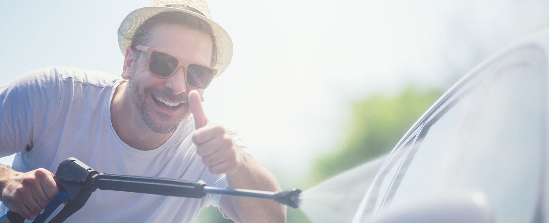 Happy Man Washing Car