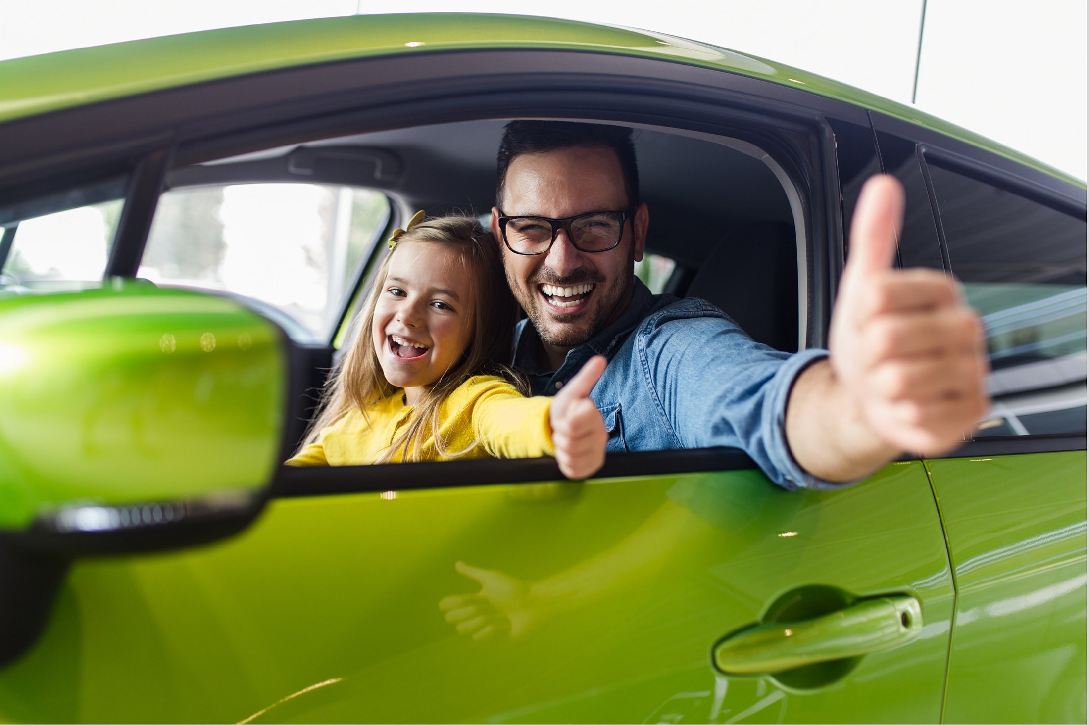 Father and Daughter happy after wash with thumbs up